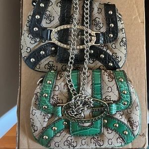 Three mini Guess change purses!